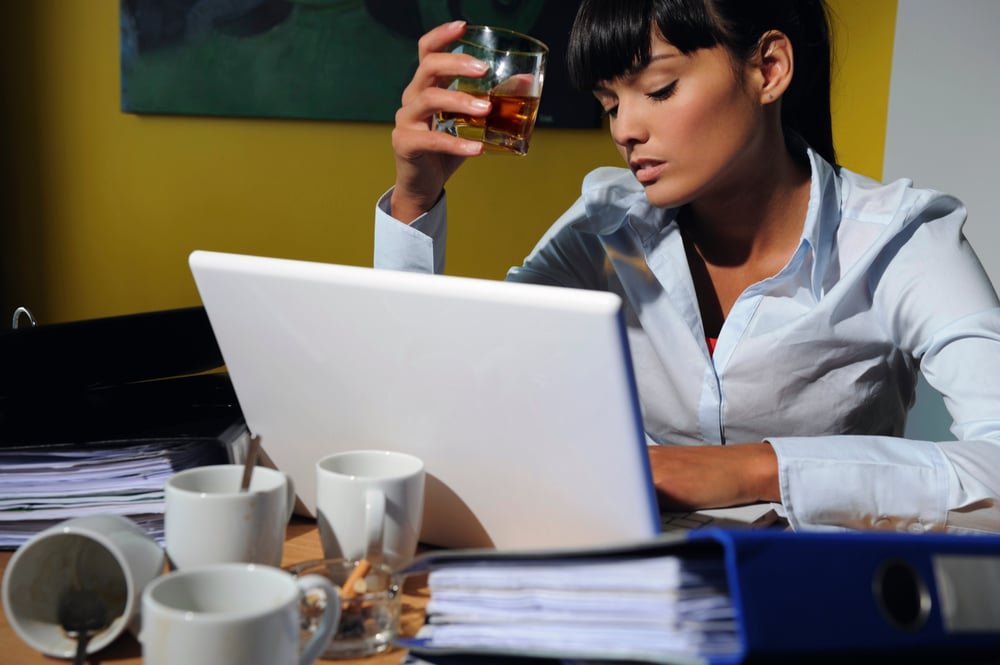 tired-businesswoman-working-at-laptop-with-drink-2026-09-24-22-58-54-utc tired-businesswoman-working-at-laptop-with-drink-2026-09-24-22-58-54-utc